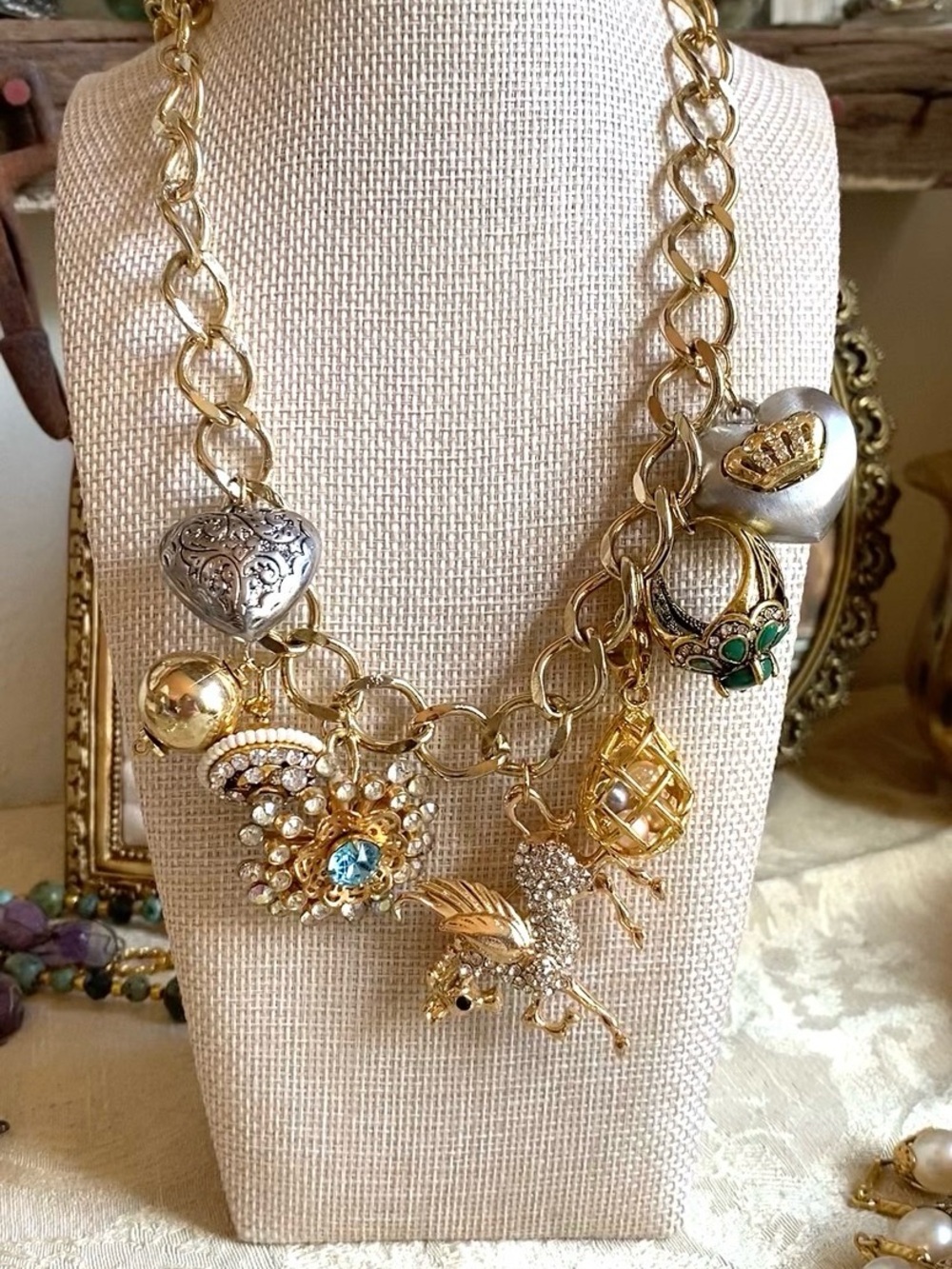 Gold-Tone Multi-Charm Statement Necklace with Crystal Accents
